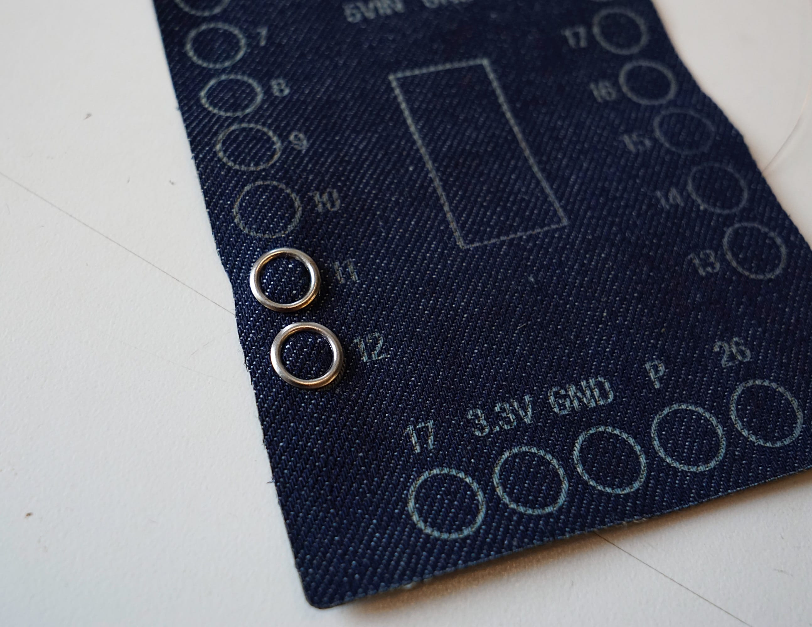 snaps inserted in the denim